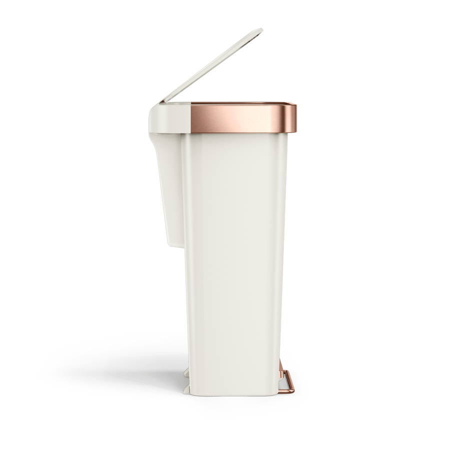 Side view of Simplehuman 45L Hybrid Step Can, Cream/Rose Gold. Partially open split lid shows slim profile.