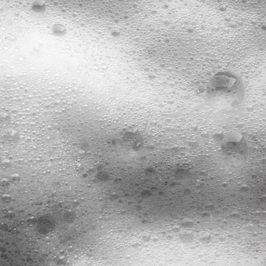 Detail view of Simplehuman Fragrance Free Liquid Dish Soap lather, rich bubbles for powerful cleaning.