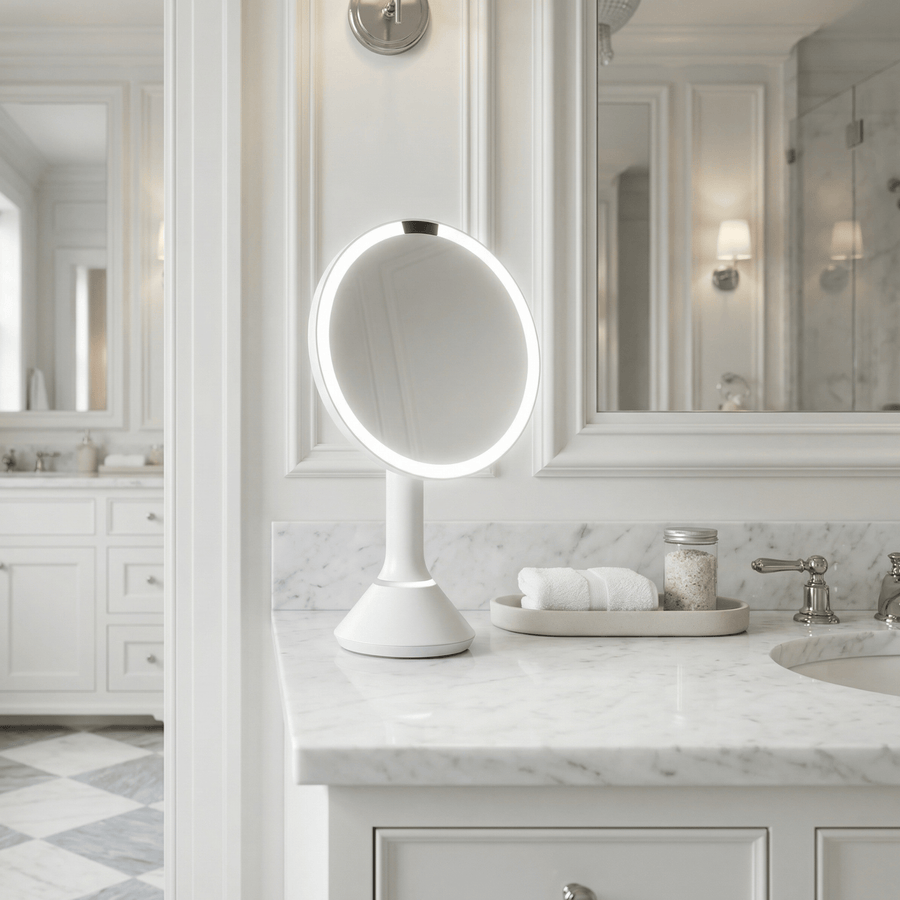 Simplehuman's Sensor Mirror Round in White in a modern bathroom setting.